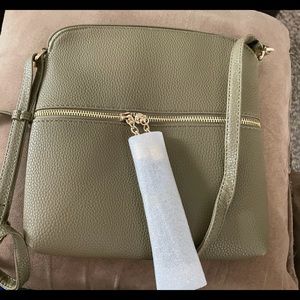 Morgan Tassel Crossbody purse. NWT. $15